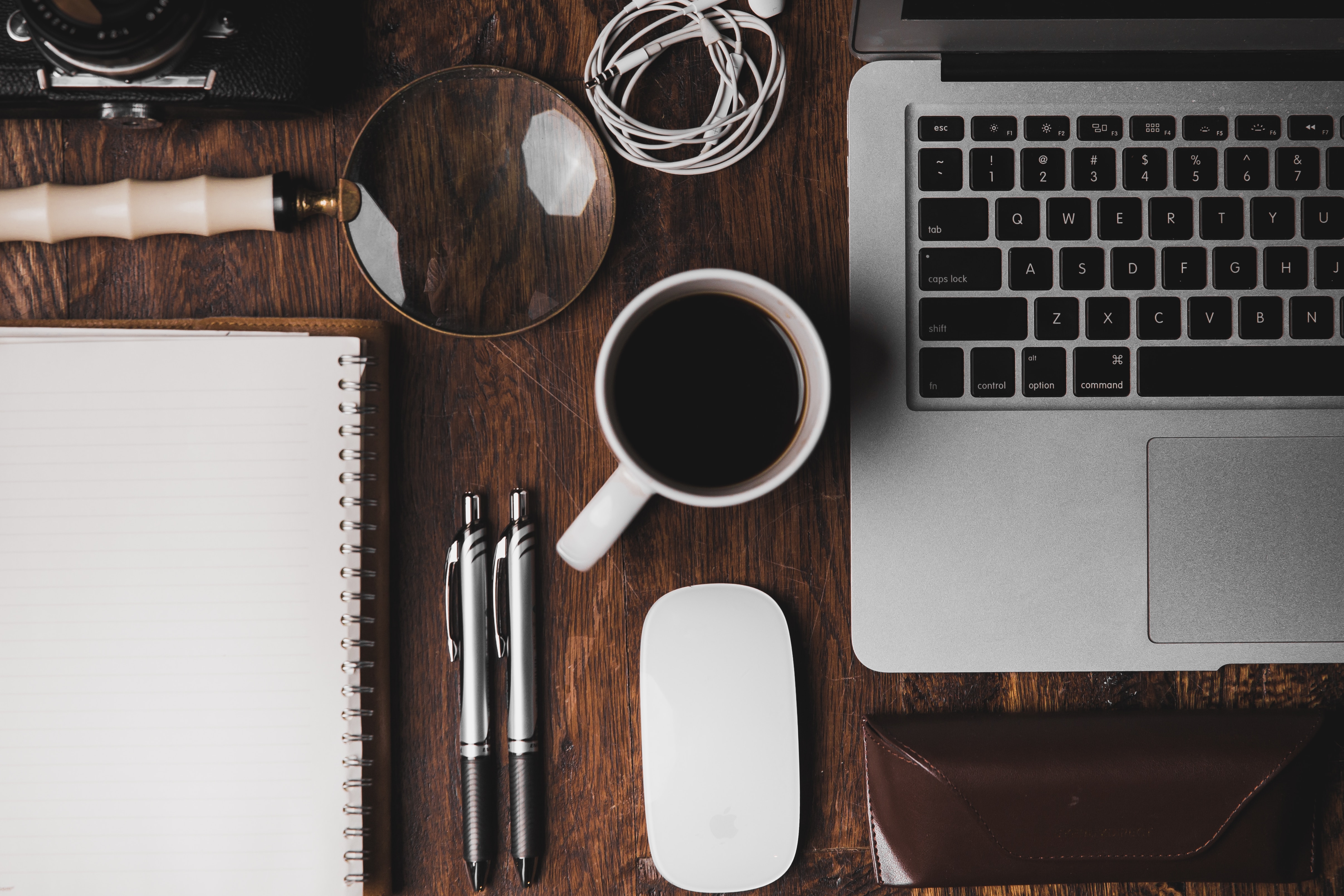 A laptop and office equipment on a desk